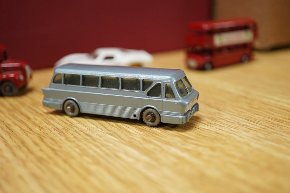 Fifteen boxed Matchbox Series 1-75 regular wheels vehicles including; Trojan van (47), Routemaster bus (5), Cement Lorry (26), Ford G.T. Racing Car (41), Ford Zephyr (33), Long Distance Coach (40), etc.